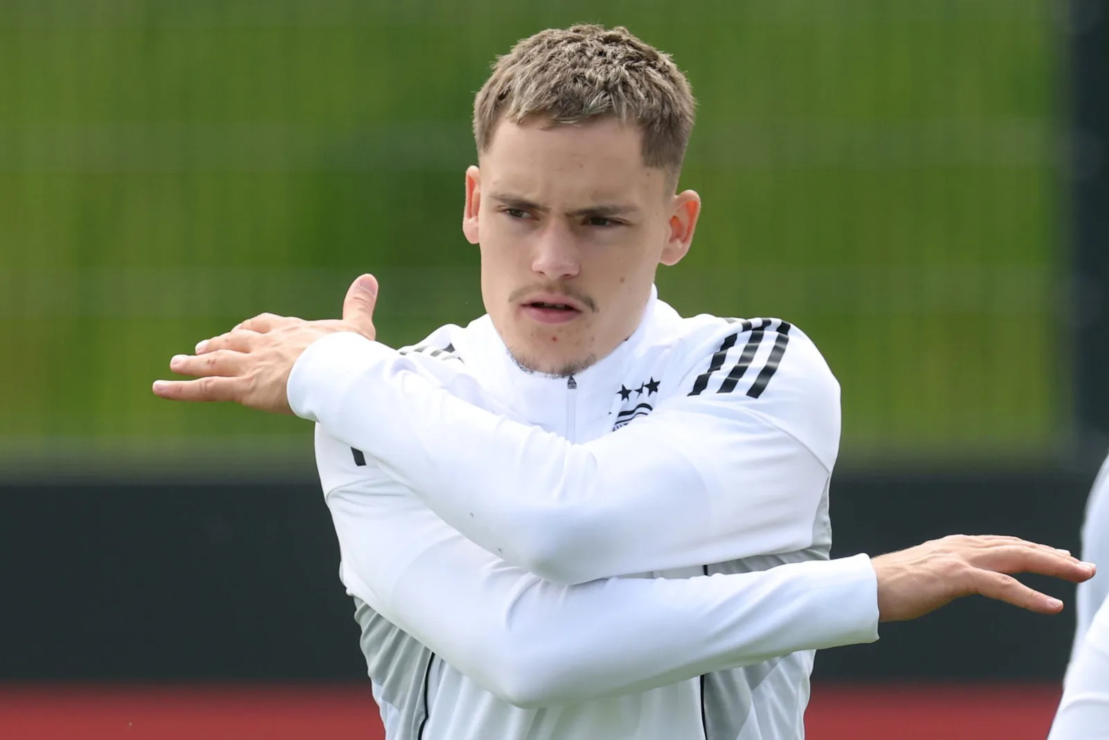 Pourquoi les fans de Liverpool peuvent «se détendre» à propos de Florian Wirtz que la position Bayer Leverkusen partagée