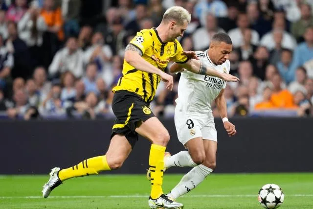 Le défenseur central de Dortmund Niklas Süle absent plusieurs mois