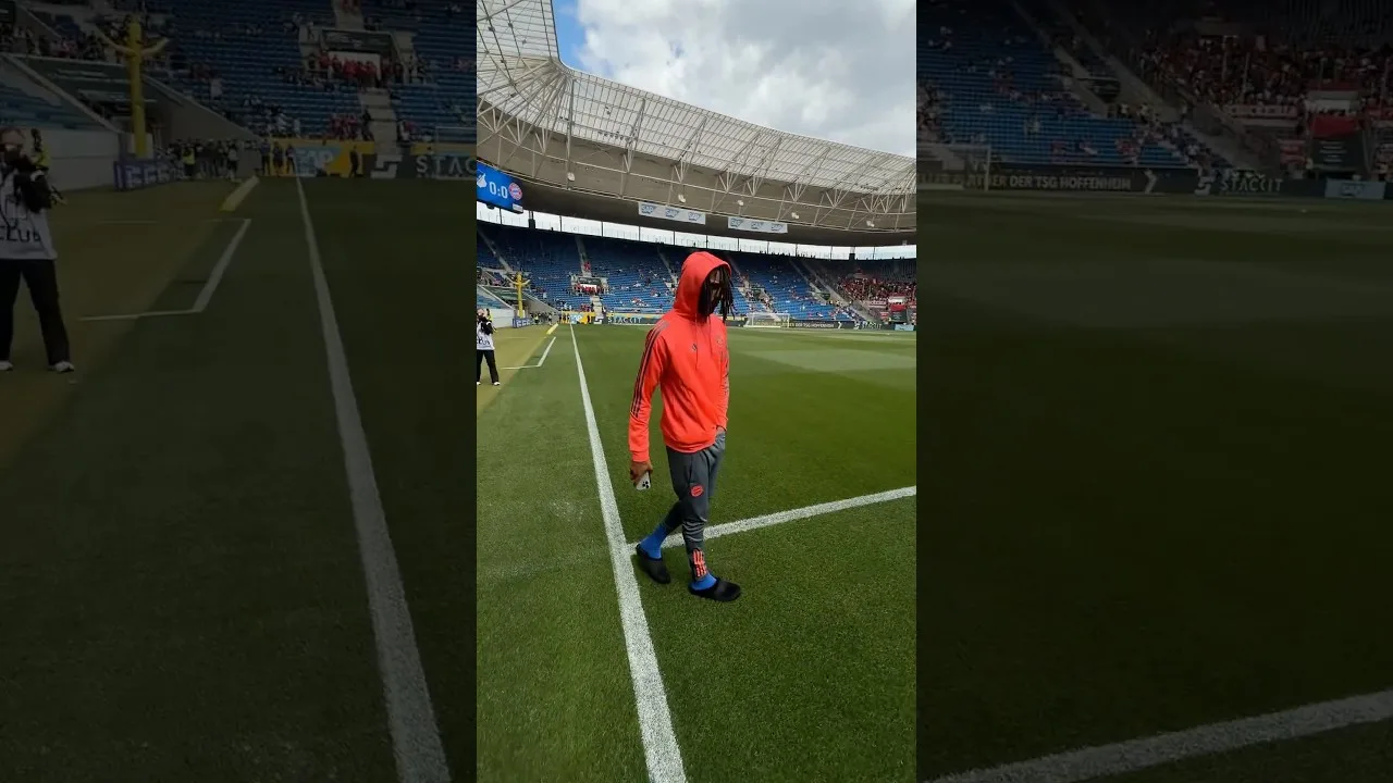 Michael Olise checking the pitch for Hoffenheim vs Bayern, last Bundesliga matchday