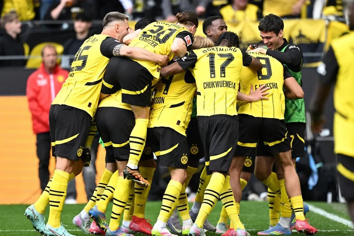 Le Borussia Dortmund a arraché la dernière place de la Ligue des champions avec une victoire sur Holstein Kiel dans la finale de la saison